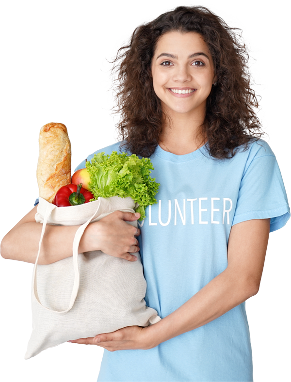 Image of a smiling young teen girl holding a bag of groceries and wearing a shirt that reads "Volunteer."