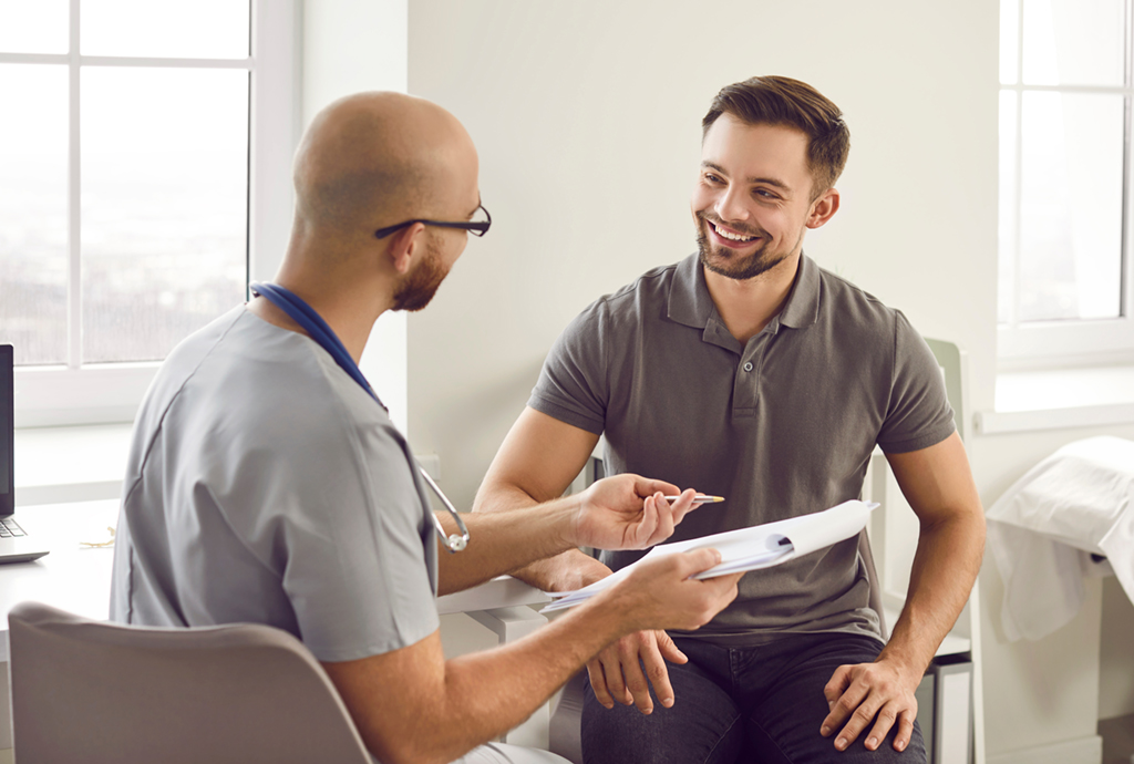 A young man visits his doctor for a checkup.