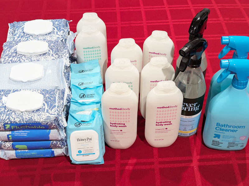 Hygiene and cleaning supplies displayed on a table